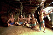 Iban Boy entertaing the elders